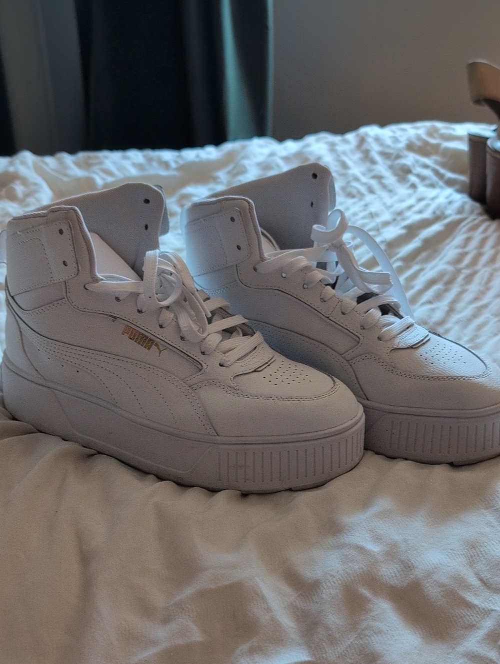 Puma White High-Top Platform Sneakers with Gold Logo